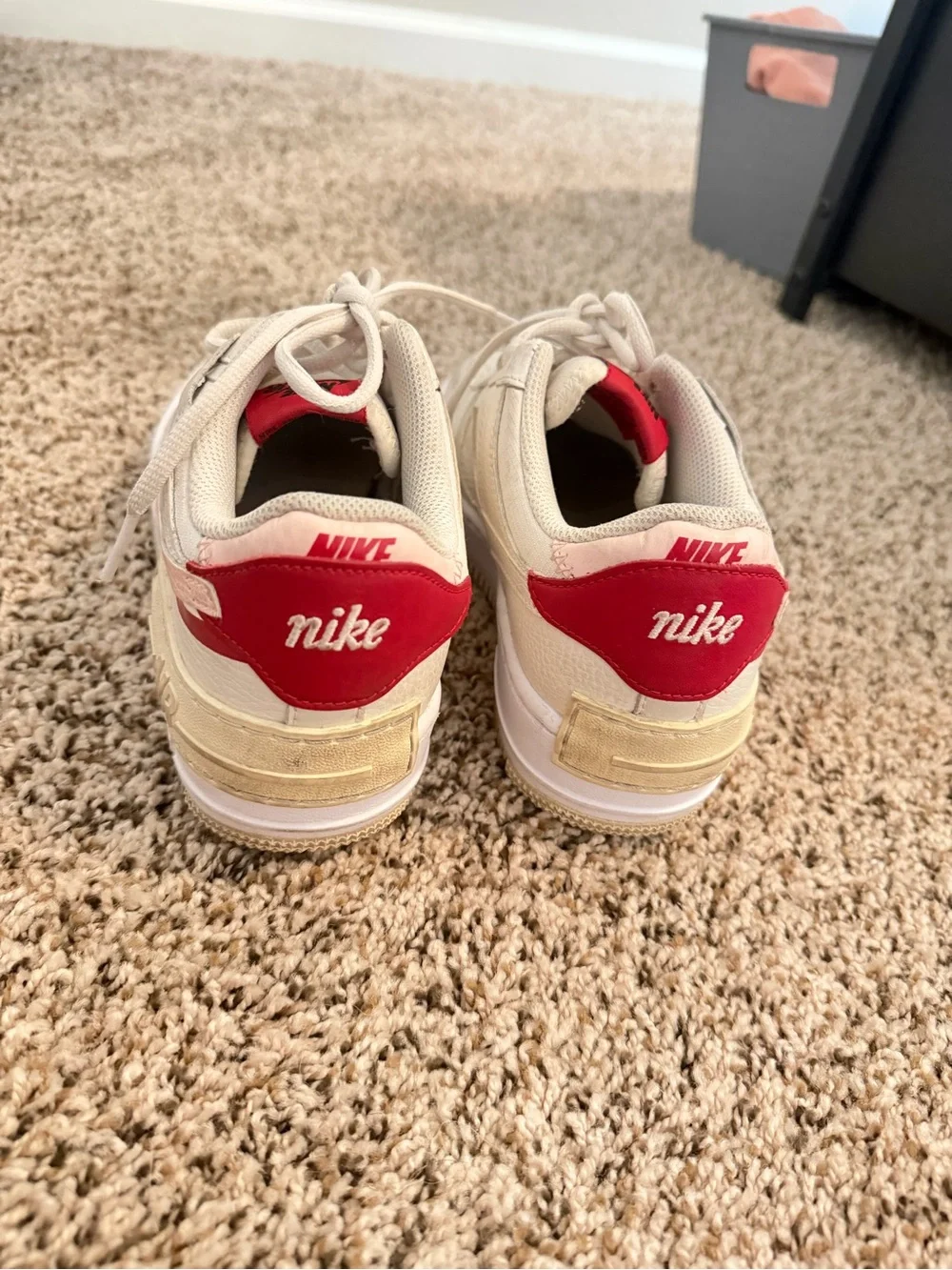 Nike Low-Top Sneakers in Cream with Pink and Red Accents